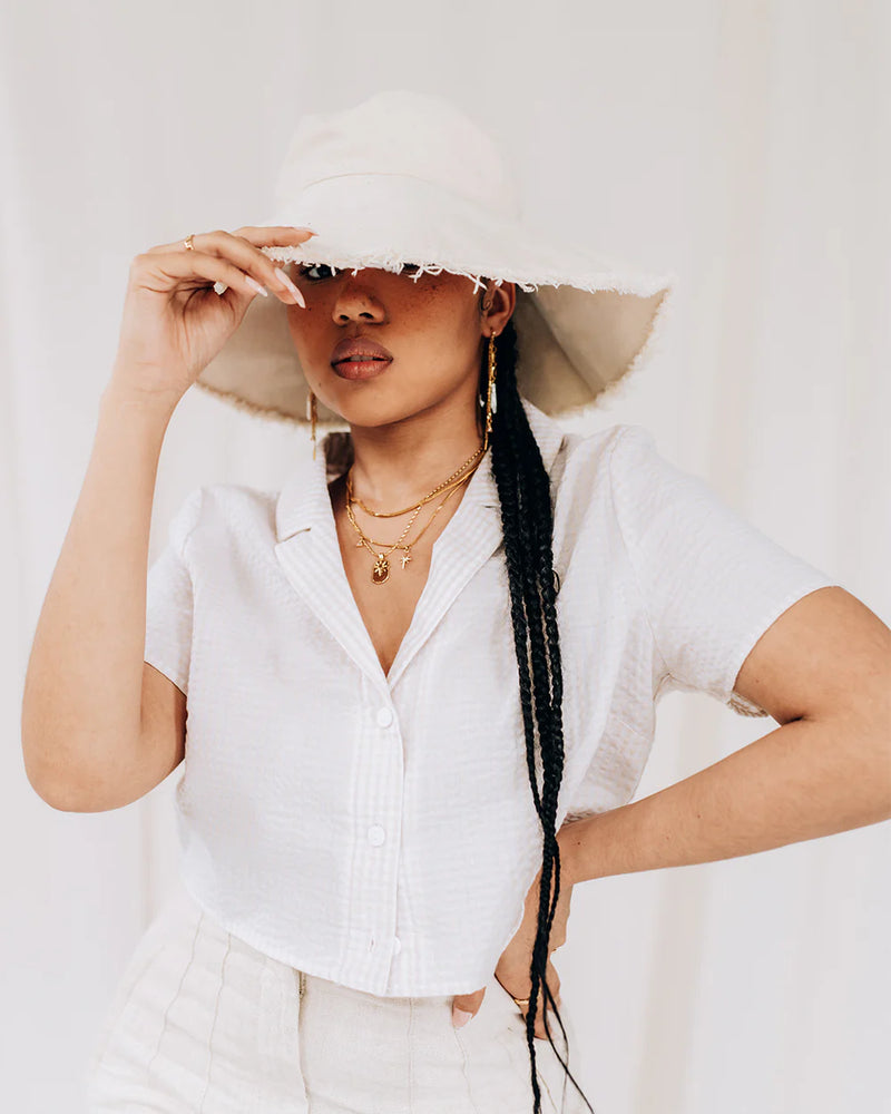 TRELLIS | GOLD CHAINS AND PEARL EARRINGS