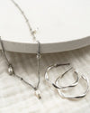 TWIST | SILVER TWISTED HOOP EARRINGS