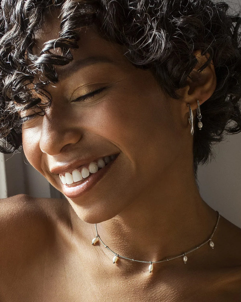 TWIST | SILVER TWISTED HOOP EARRINGS