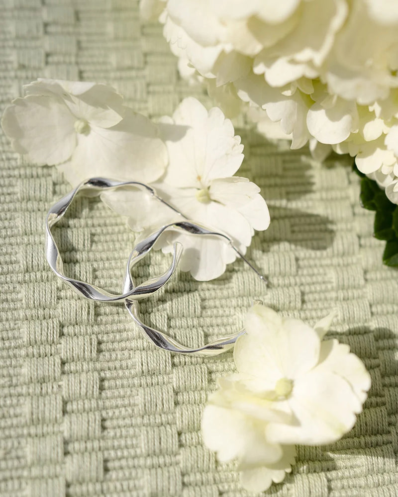 TWIST | SILVER TWISTED HOOP EARRINGS