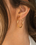 TWIST | GOLD TWISTED HOOP EARRINGS