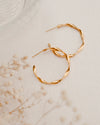 TWIST | GOLD TWISTED HOOP EARRINGS