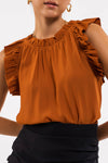 Sleeveless Ruffle Hem Woven Top (Rust)