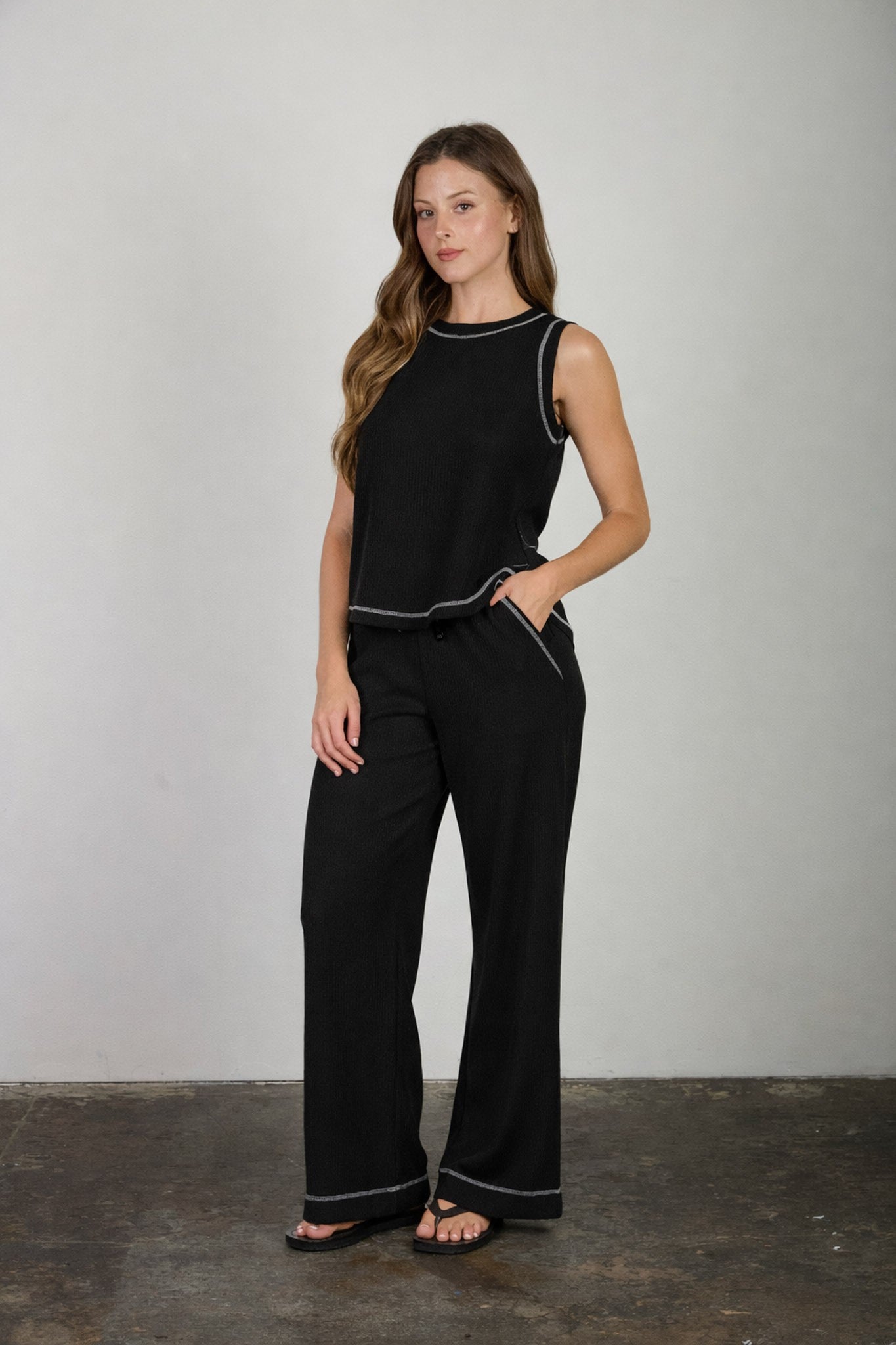 Back Button Sleeveless Ribbed Knit Top (Black)