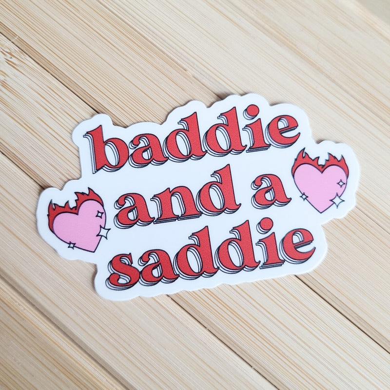 eleven. || "Baddie And A Saddie" Sticker