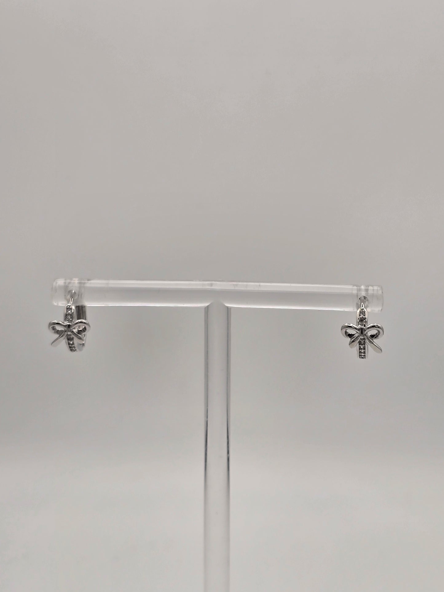 Stainless Steel Small Bow Sparkle Huggies in Gold or Silver