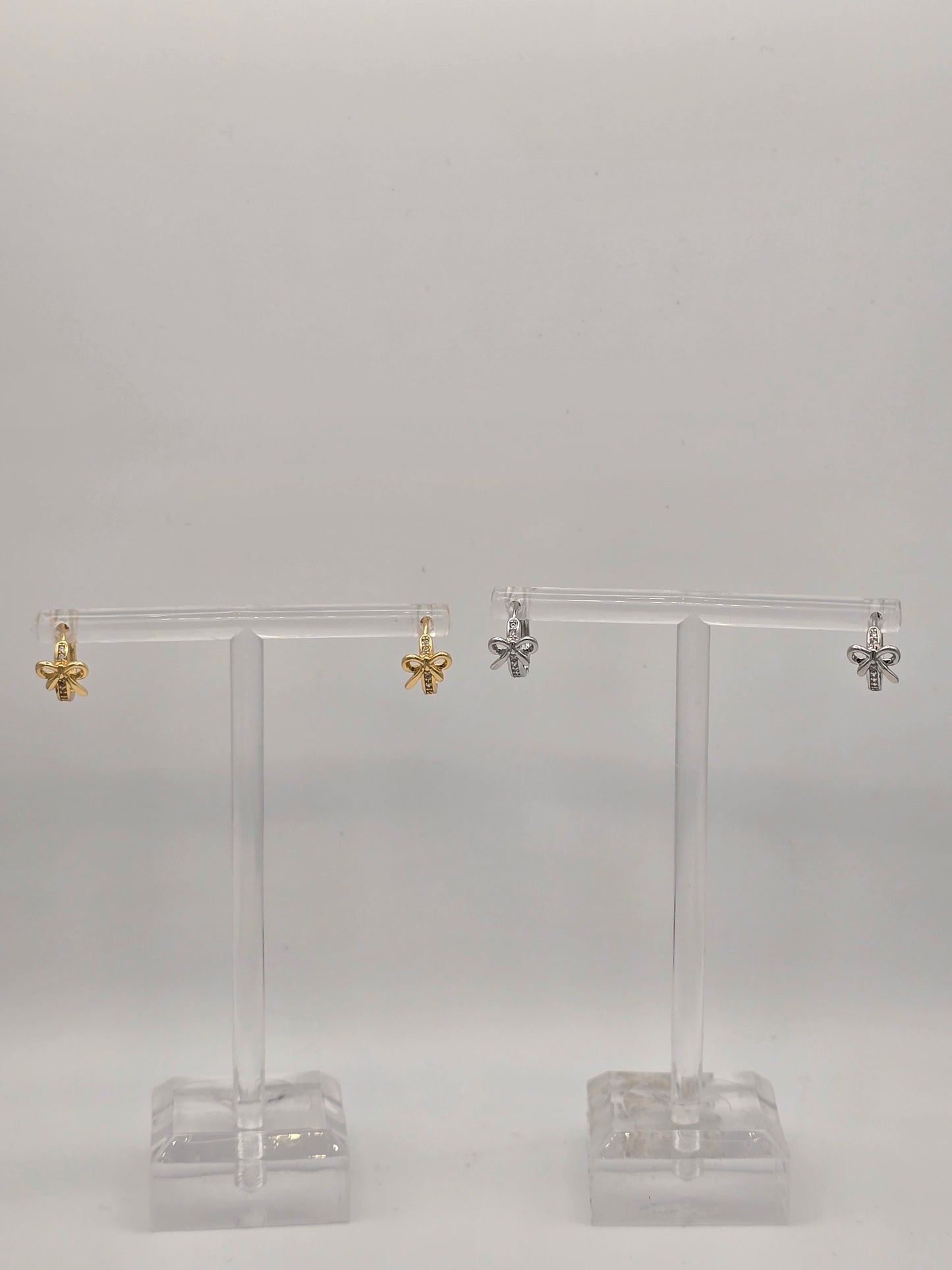 Stainless Steel Small Bow Sparkle Huggies in Gold or Silver