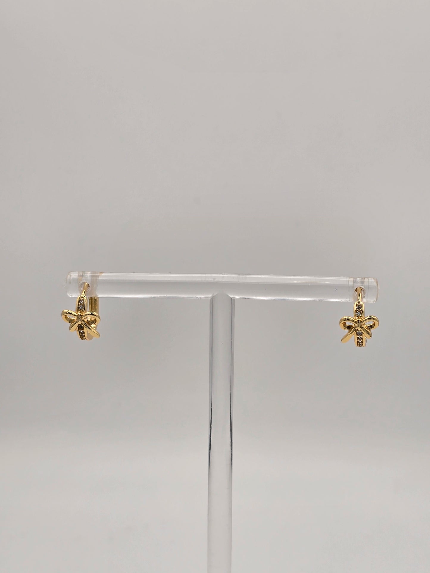 Stainless Steel Small Bow Sparkle Huggies in Gold or Silver