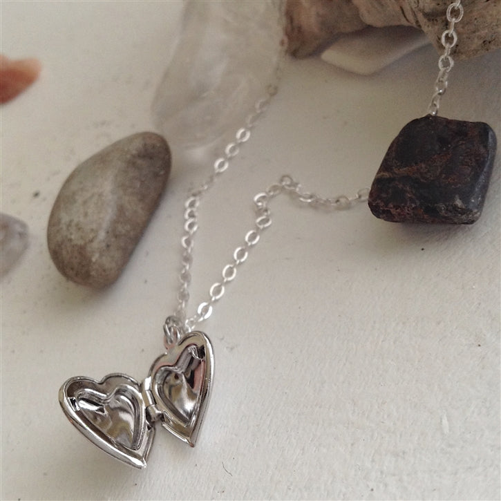 "Total Eclipse of the Heart" Tiny Heart Shaped Locket (Silver)